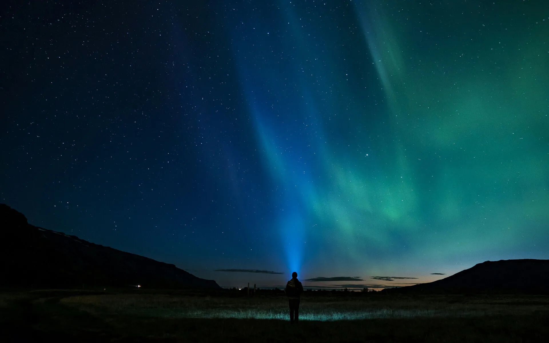 Northern lights over a quiet landscape